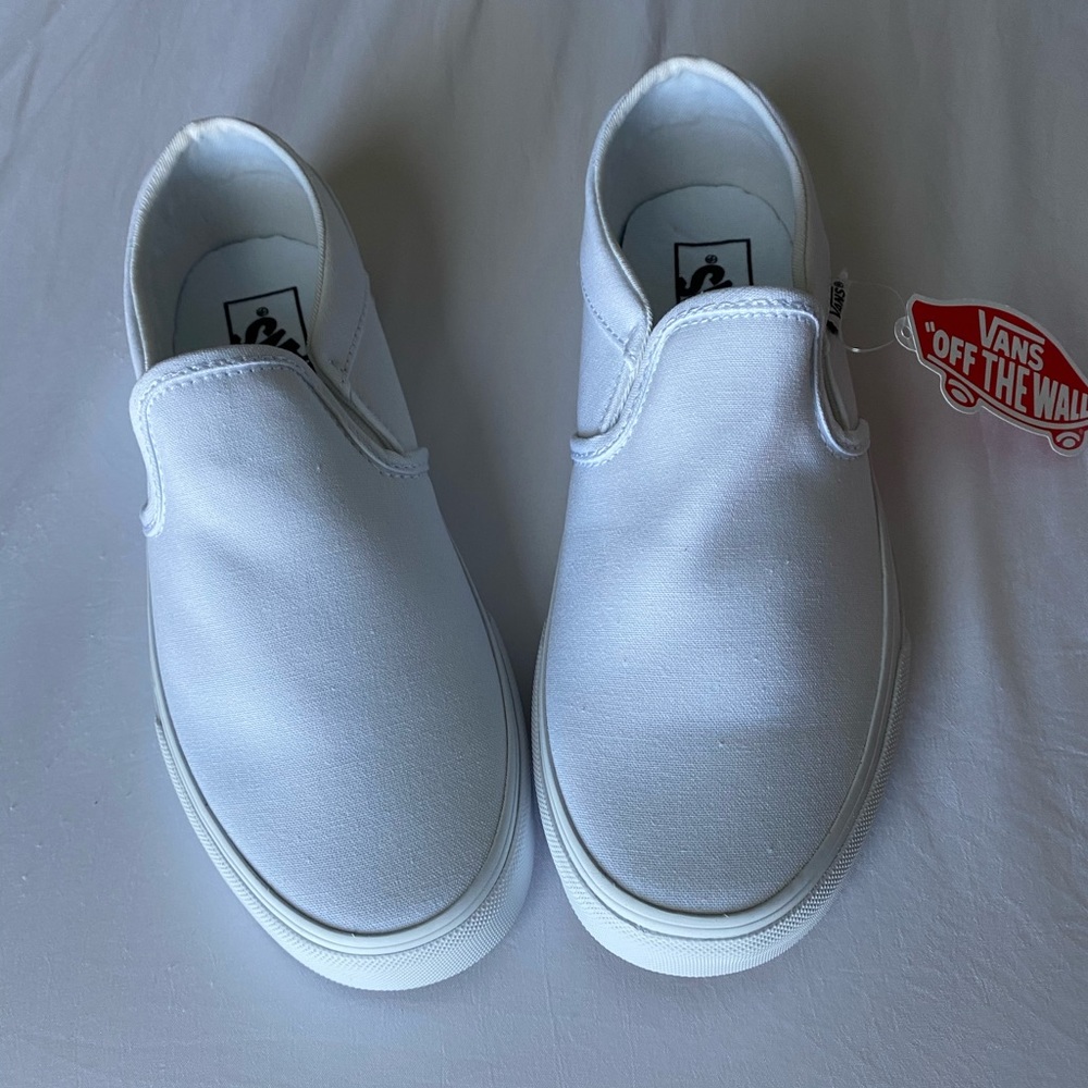 White slip on vans